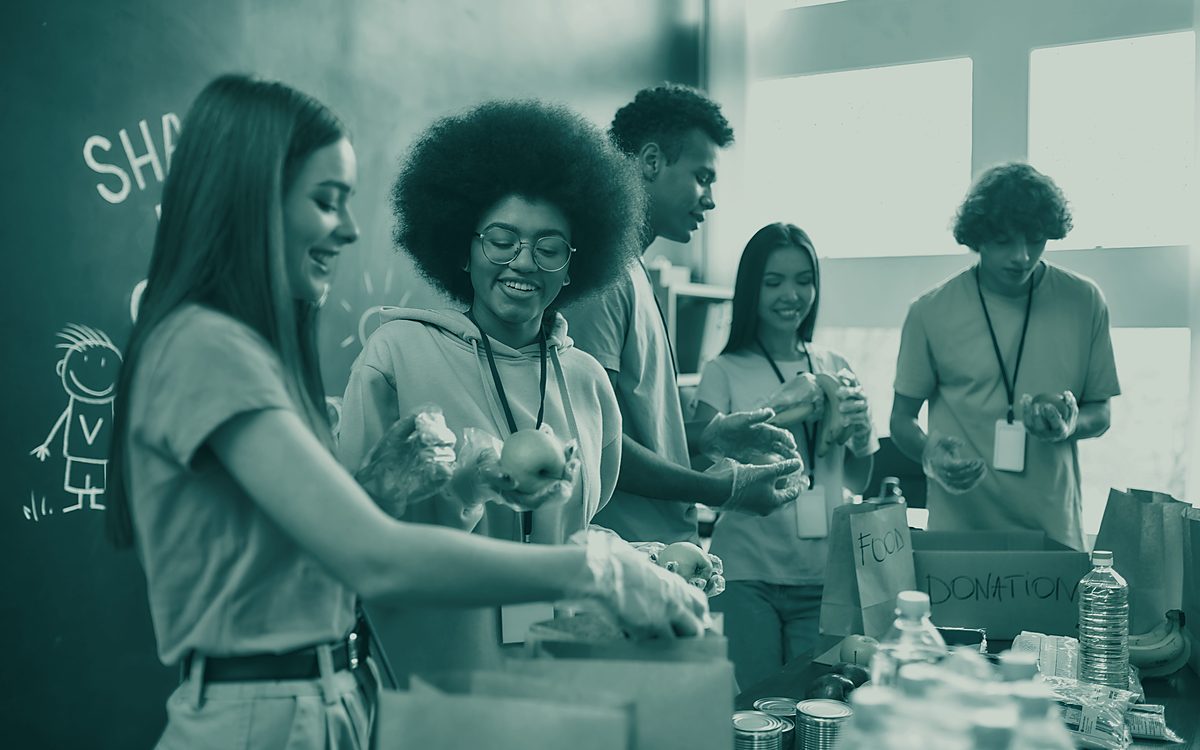 Volunteers sorting food donations at a community project
