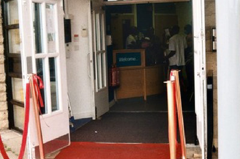 The entrance to the HUDAWI Centre with a red carpet